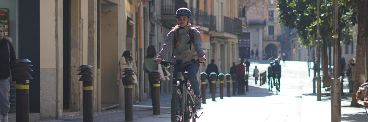 Woman on a City bike cycling through the city